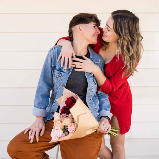 Couple holding flowers from Native Poppy