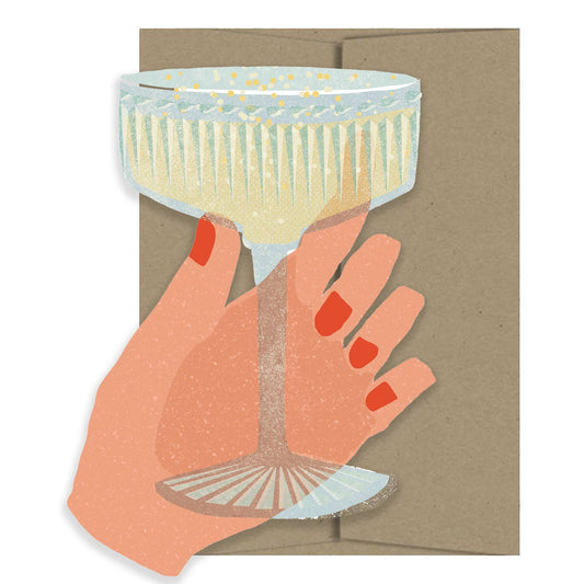 Card with a hand holding a champagne glass on a brown envelope