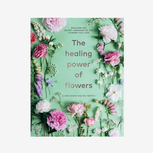 Book cover of 'The Healing Power of Flowers' by Claire Bowen with floral design on a green background