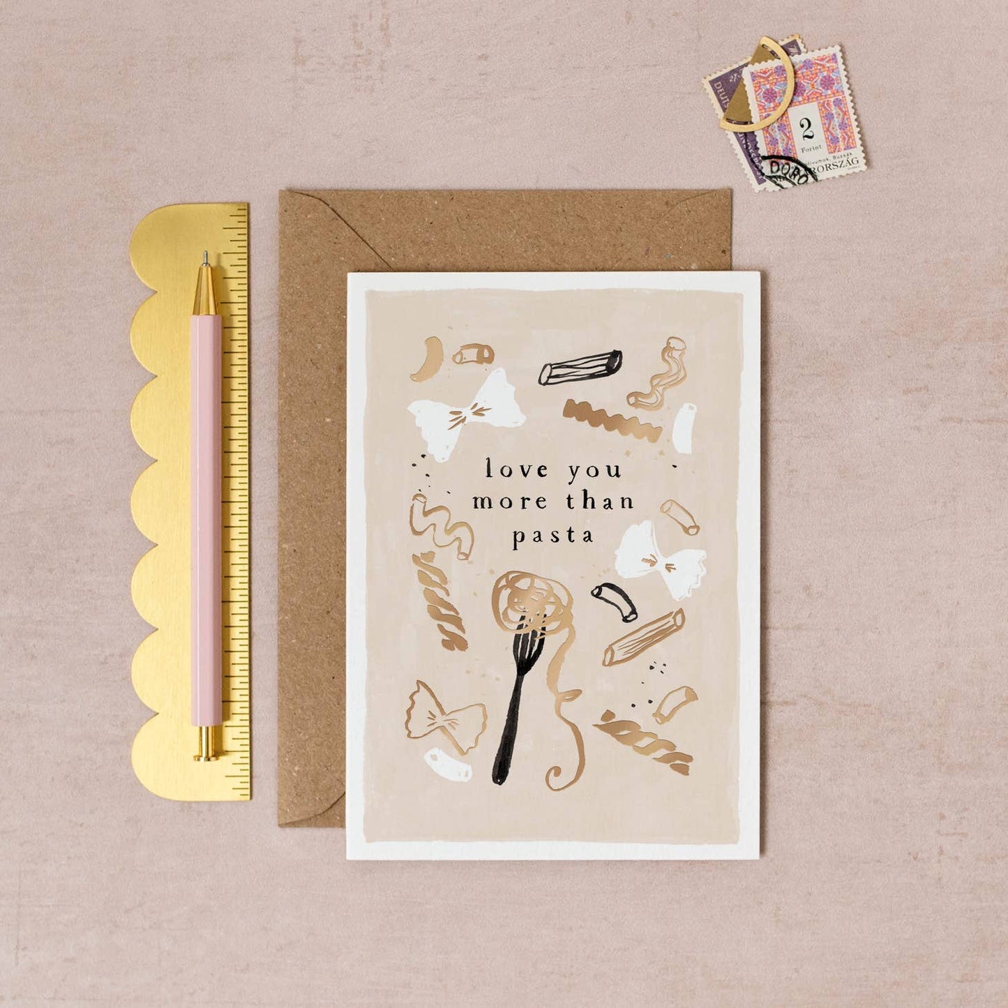Love You More Than Pasta Card with pen, ruler, and stamps