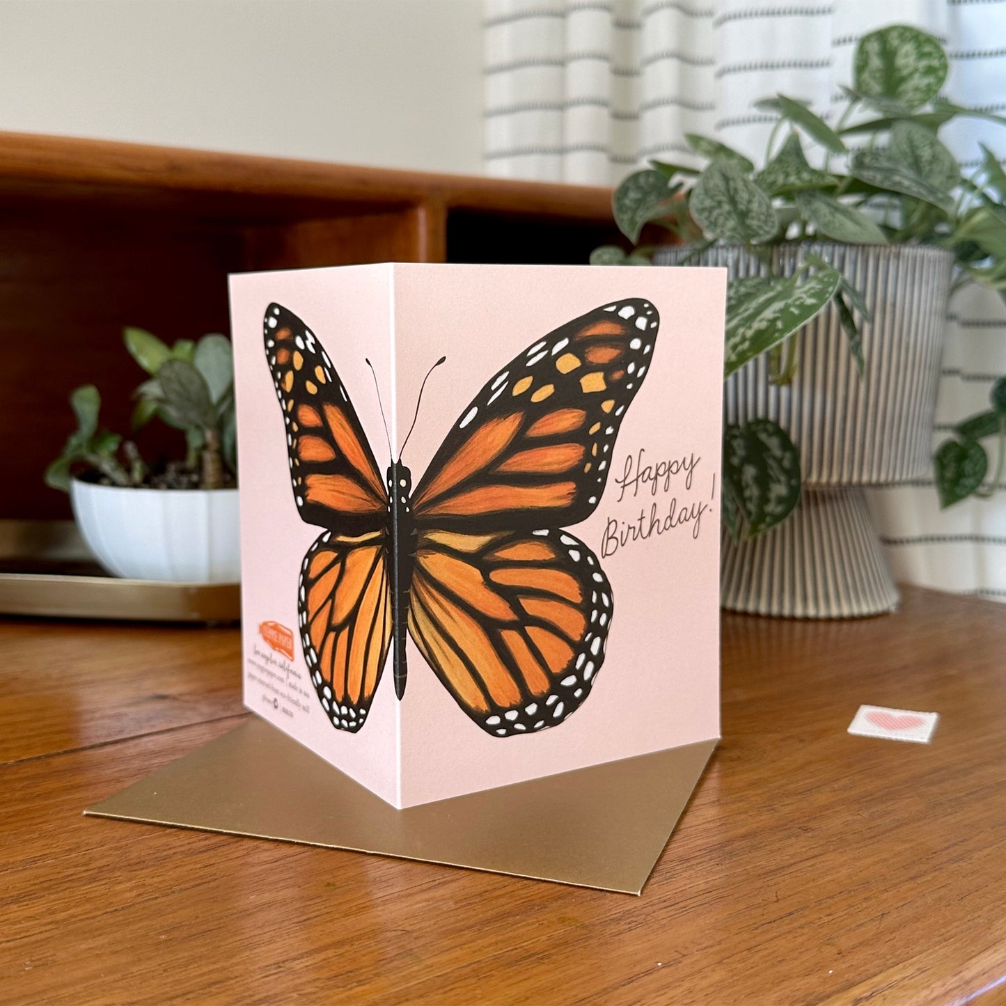 Monarch Butterfly Birthday Card from Yeppie Paper displayed on a desk