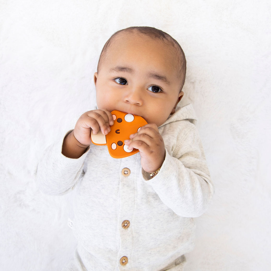 Baby chews a Mushroom Silicone Teether