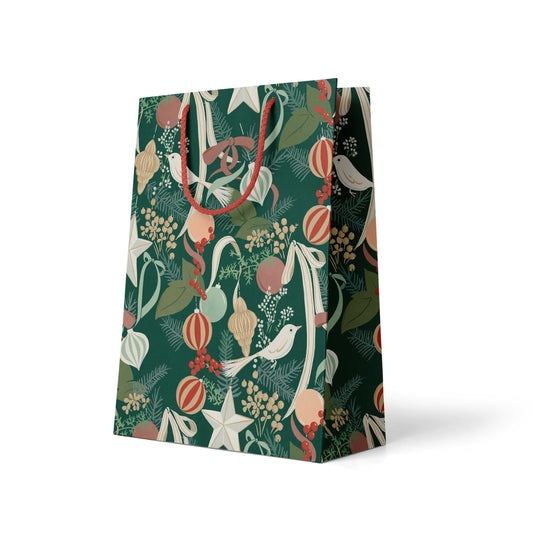 Decorative gift bag with festive design on a white background