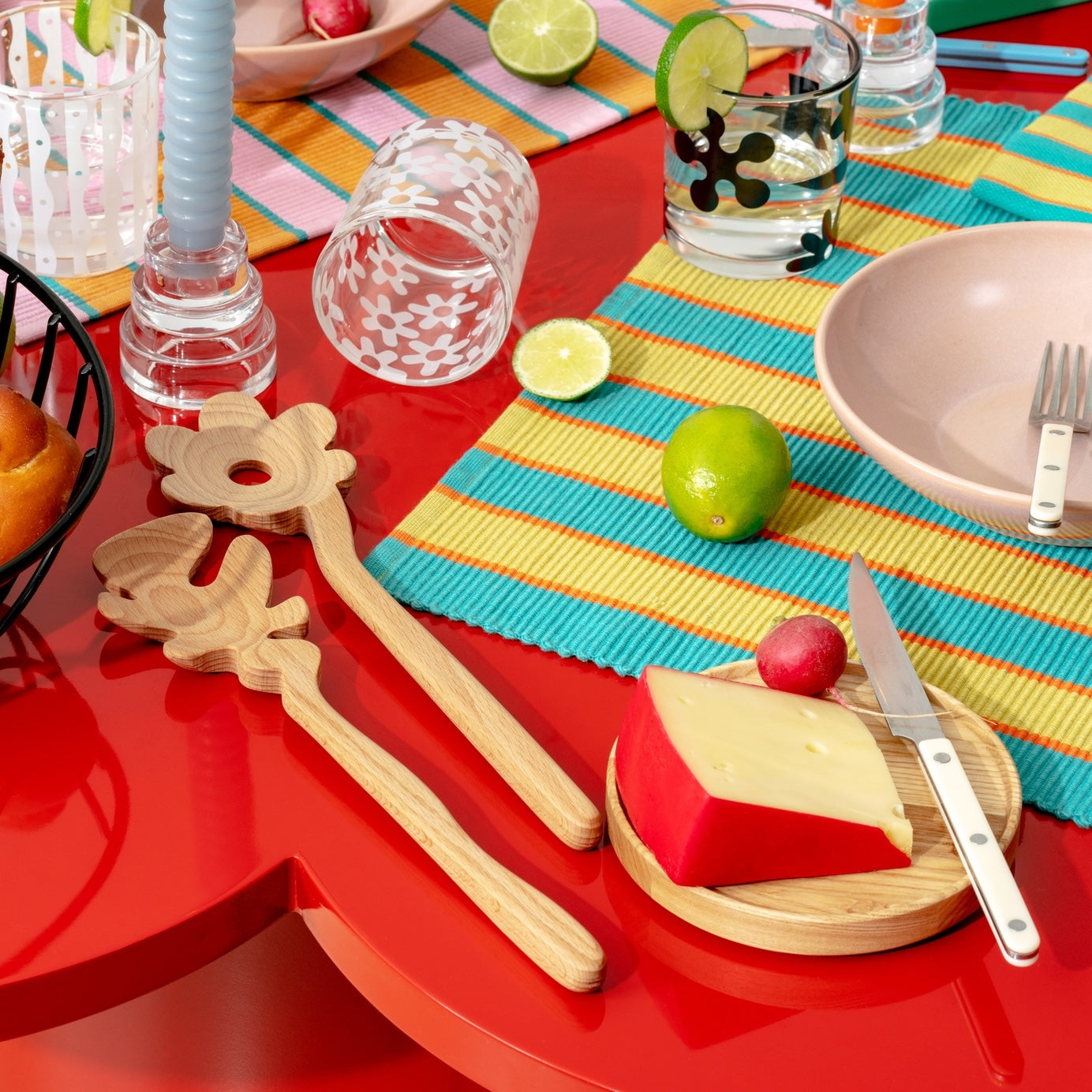 Wooden Flower Serving Spoons on colorful table