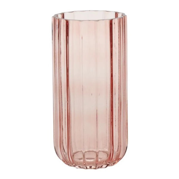 Soft color, clean lines, and just enough texture. The Tanger Vase is made from blush-toned glass with subtle vertical ribbing that catches the light beautifully. Its tall, streamlined shape makes it an easy choice for fresh-cut stems and airy floral arrangements, adding a hint of color without competing with the blooms.