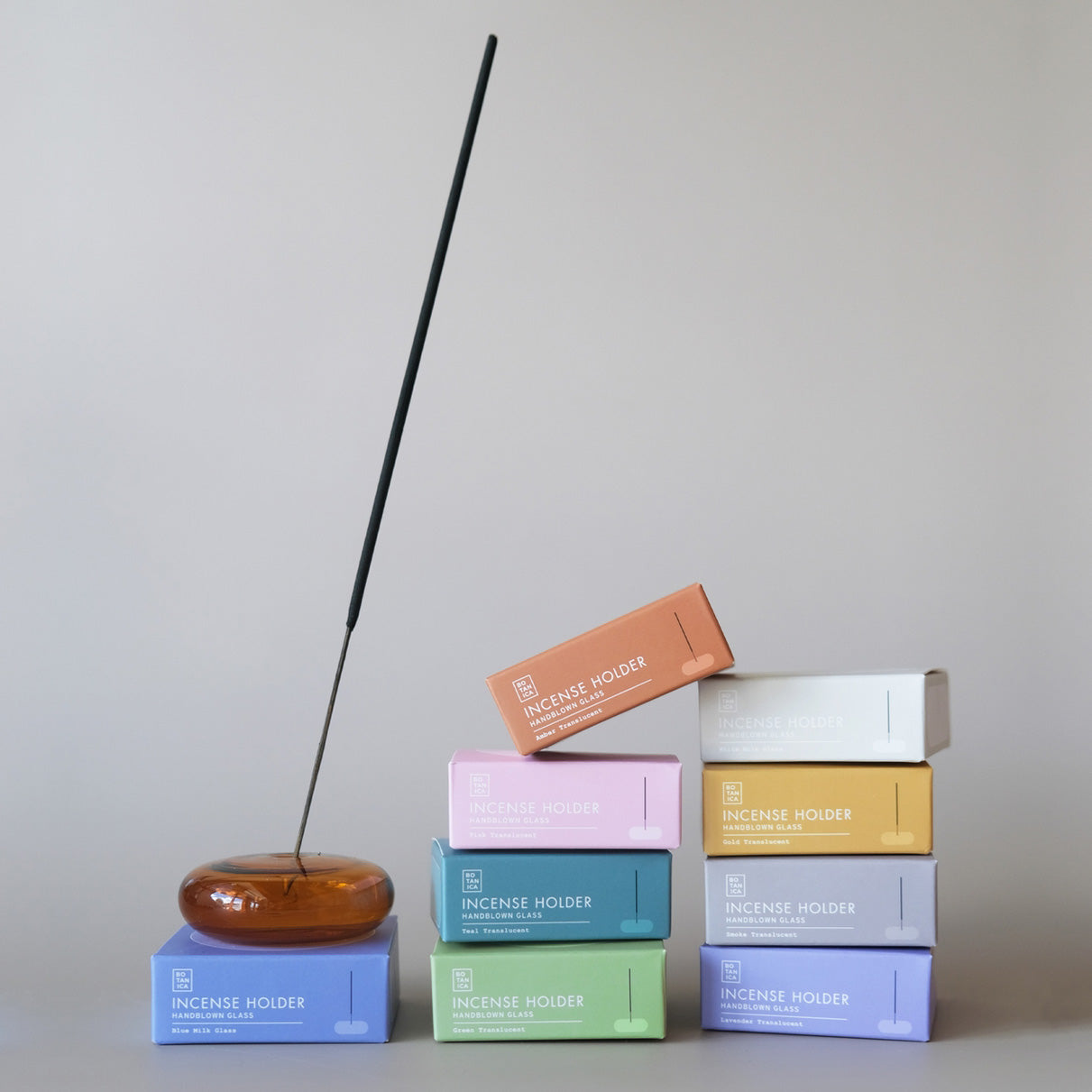 Bubble Glass Incense Holders packed in colorful boxes