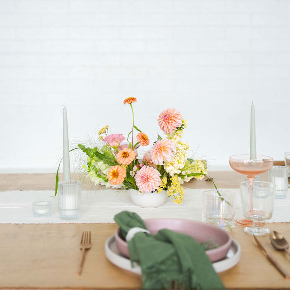 Dainty centerpiece flower arrangement on a formal table