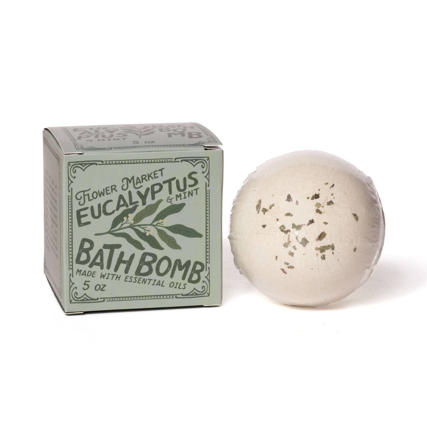 Eucalyptus and mint bath bomb with packaging on a white background