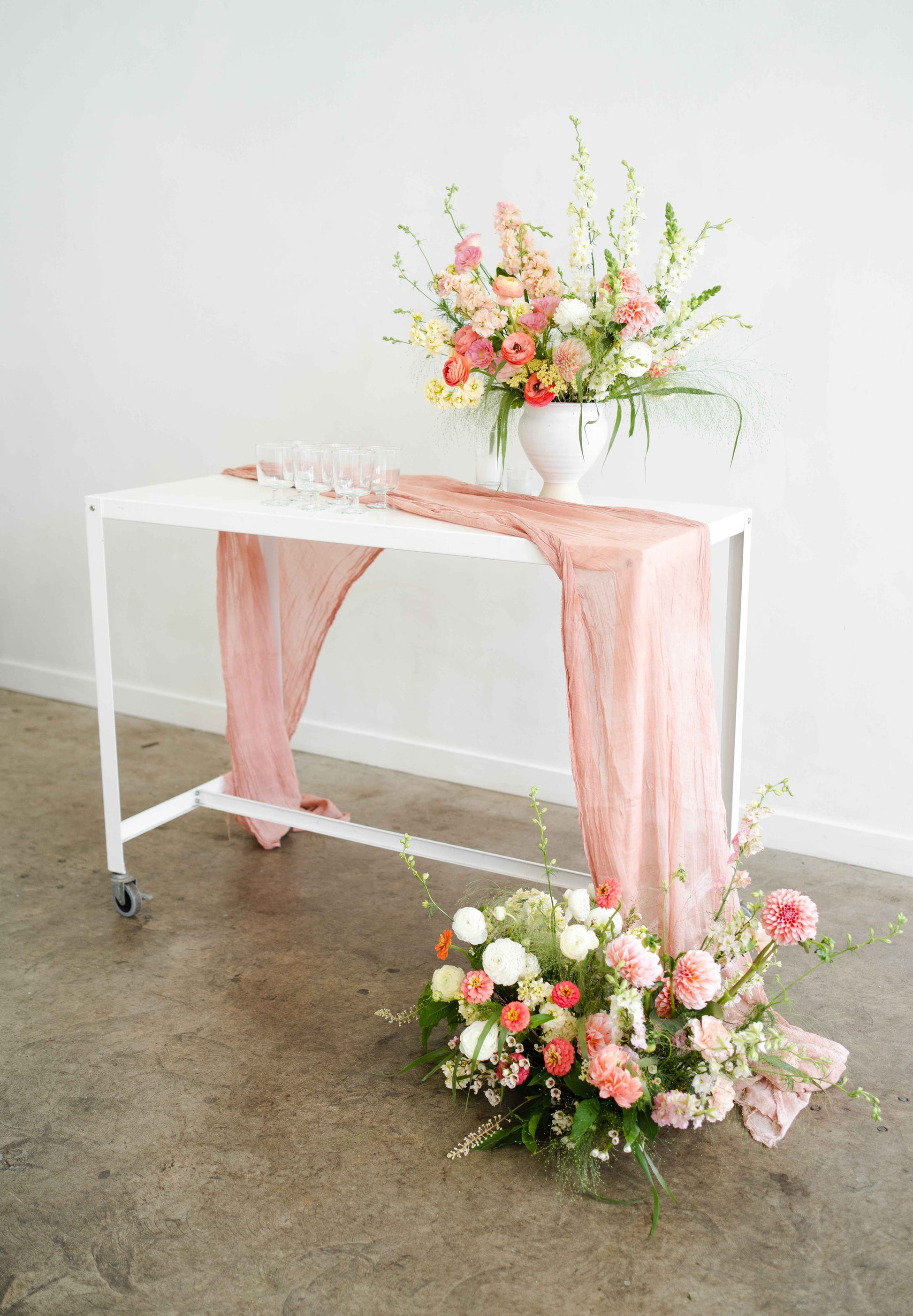 Wildflower Meadow Aisle Marker in front of tall linen-draped table