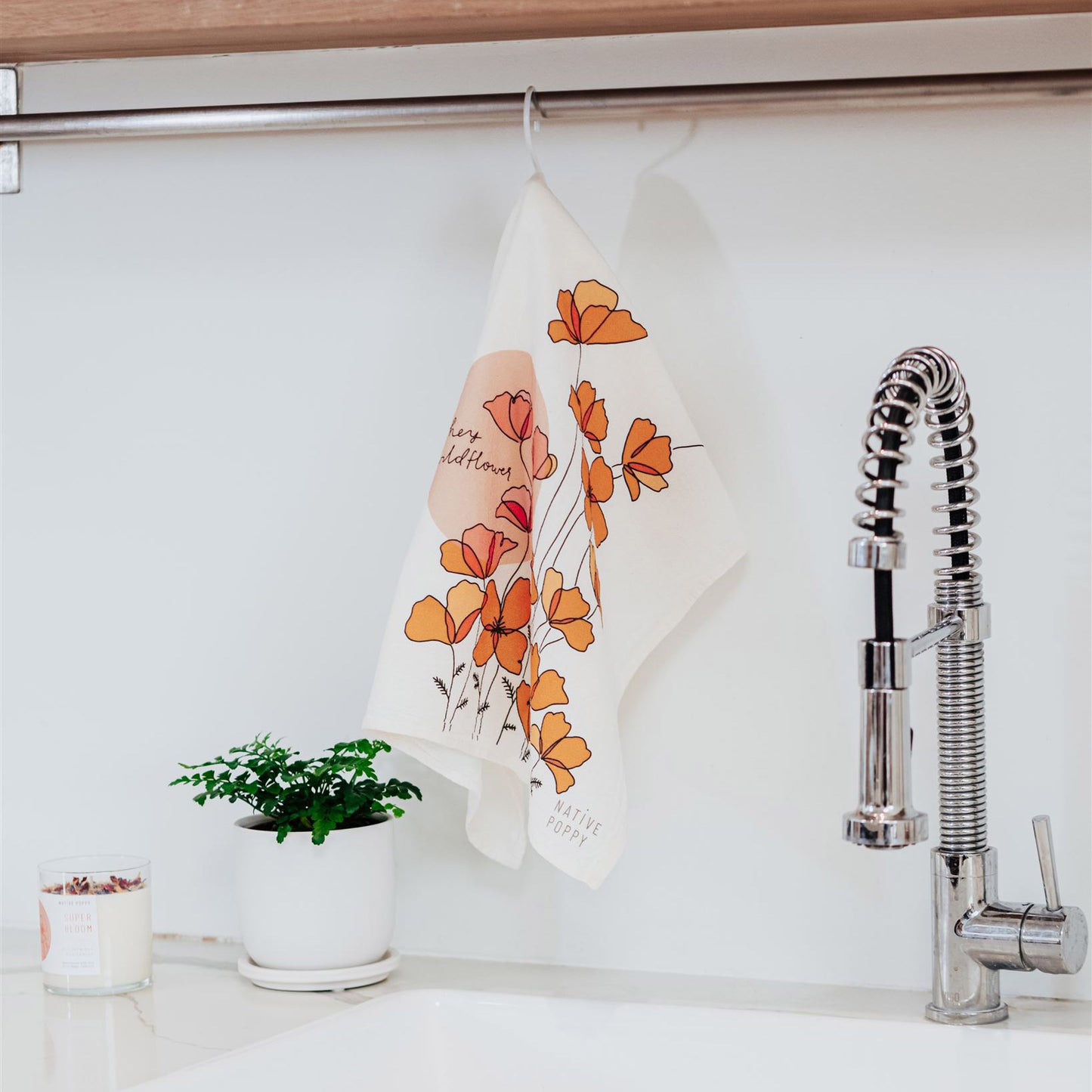 Orange Poppy flour sack dish towel in kitchen