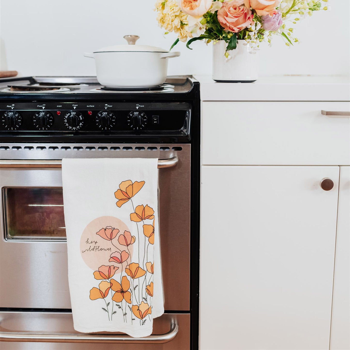 Native Poppy tea towel with orange and pink poppies