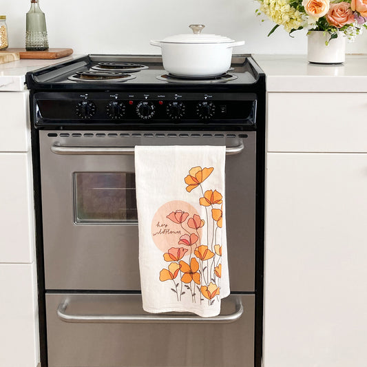 Native Poppy tea towel in kitchen