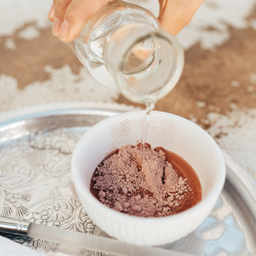 Mixing Rosehip & Clay Mask with water