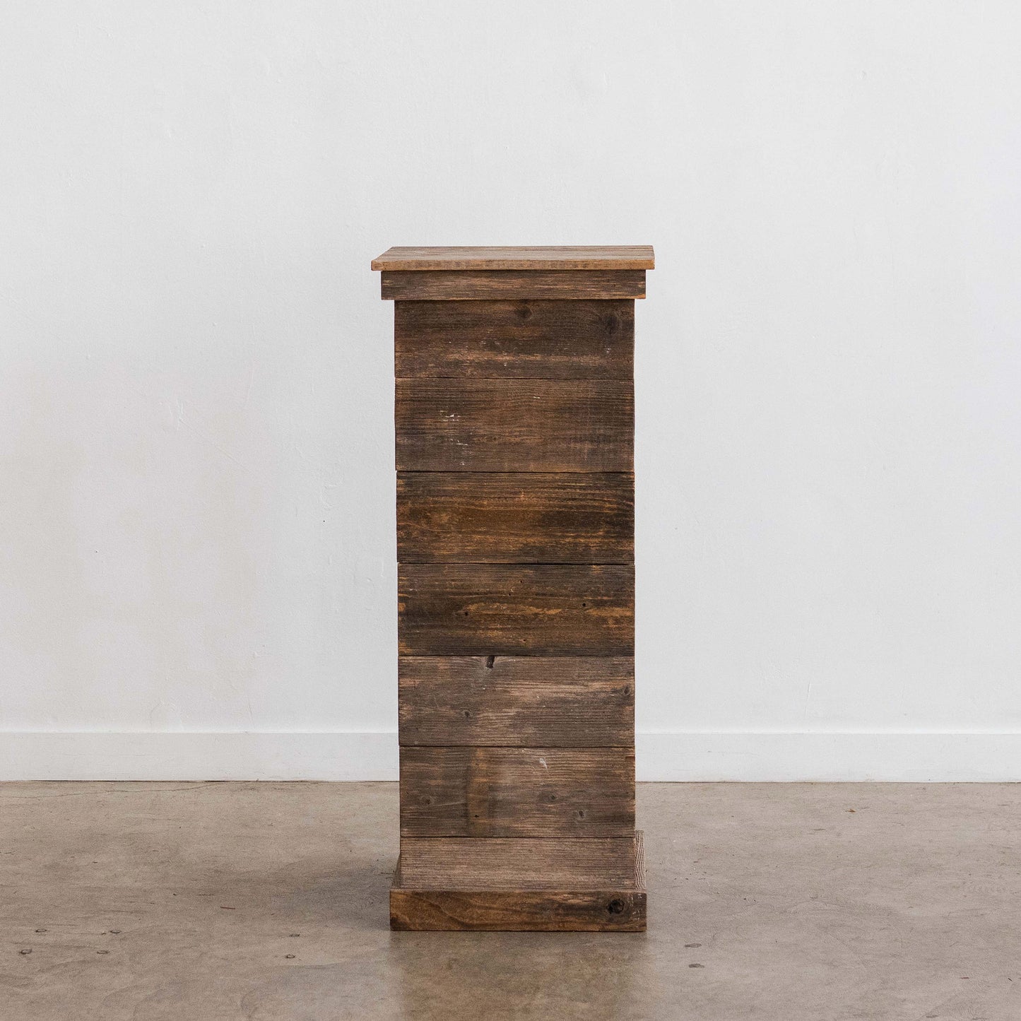 tall wooden pedestal for events of display