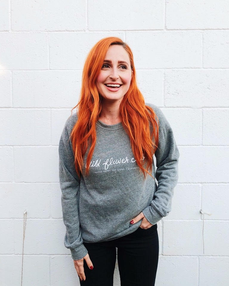 Woman with red hair wearing Wild Flower Club Sweatshirt - Gray