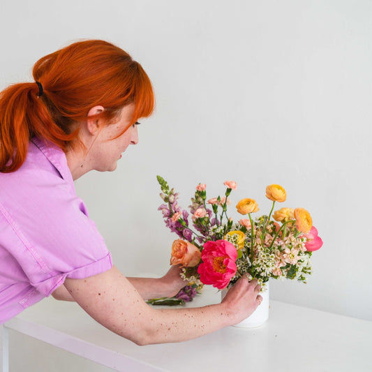 Adjusting Native Poppy's Mother's Day flowers behind the scenes