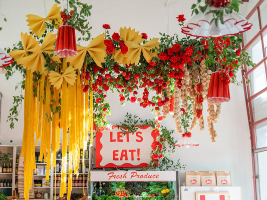 Oversized pasta wedding reception decor