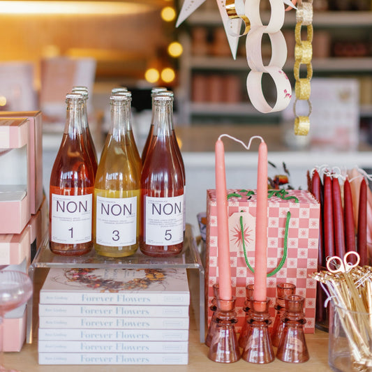 NA wine, candles, and gifts in Native Poppy’s flower shop
