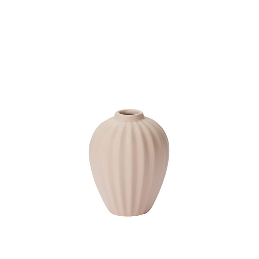 Beige pink ceramic vase on a white background