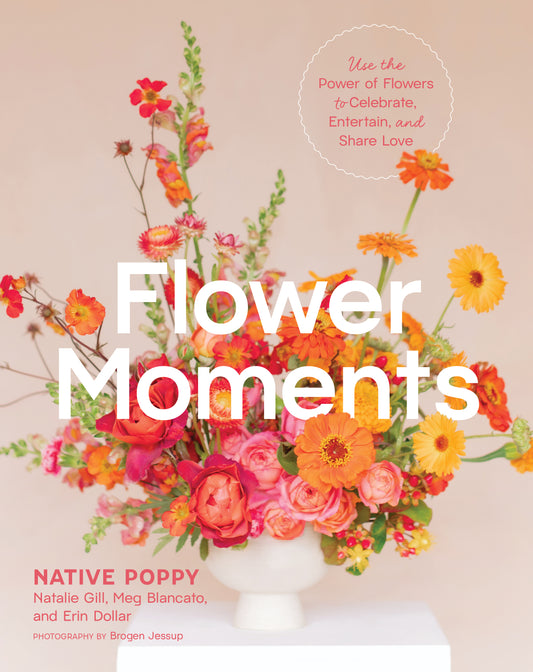 Book cover of 'Flower Moments' with a vibrant floral arrangement on a beige background