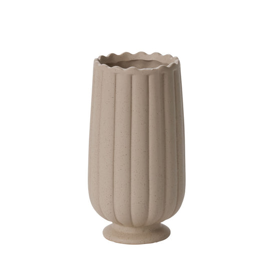 Beige ceramic vase with textured design on a white background