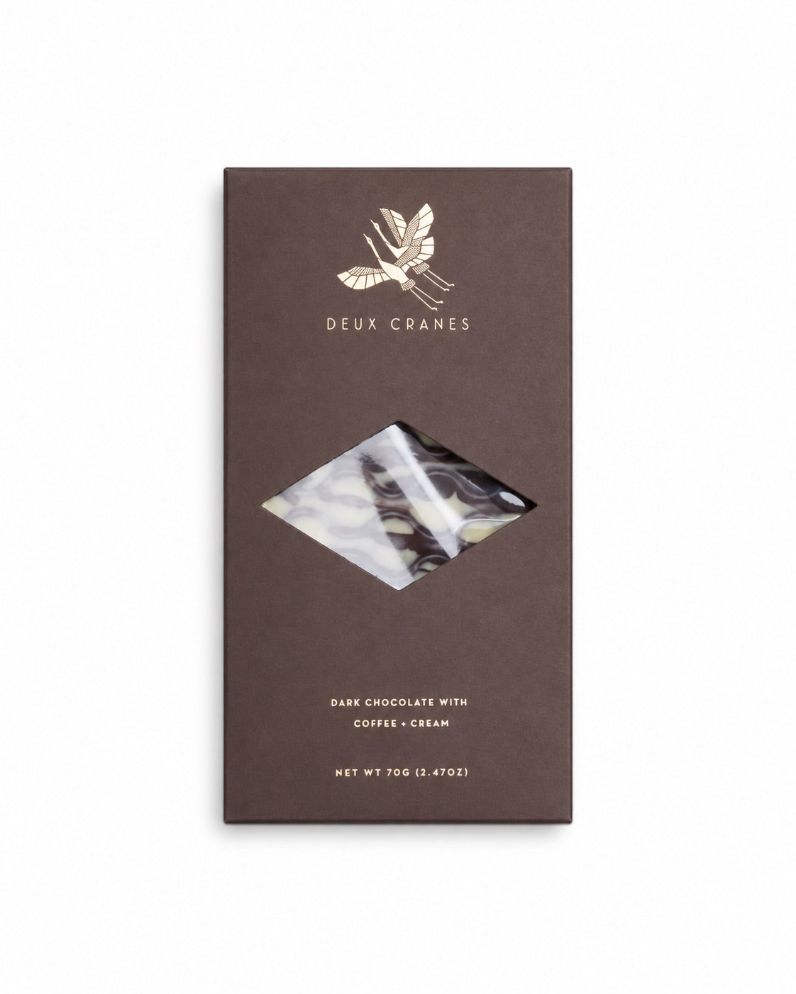 This chocolate bar is an homage to the warm and cozy feeling a steaming cup of coffee and cream evokes.