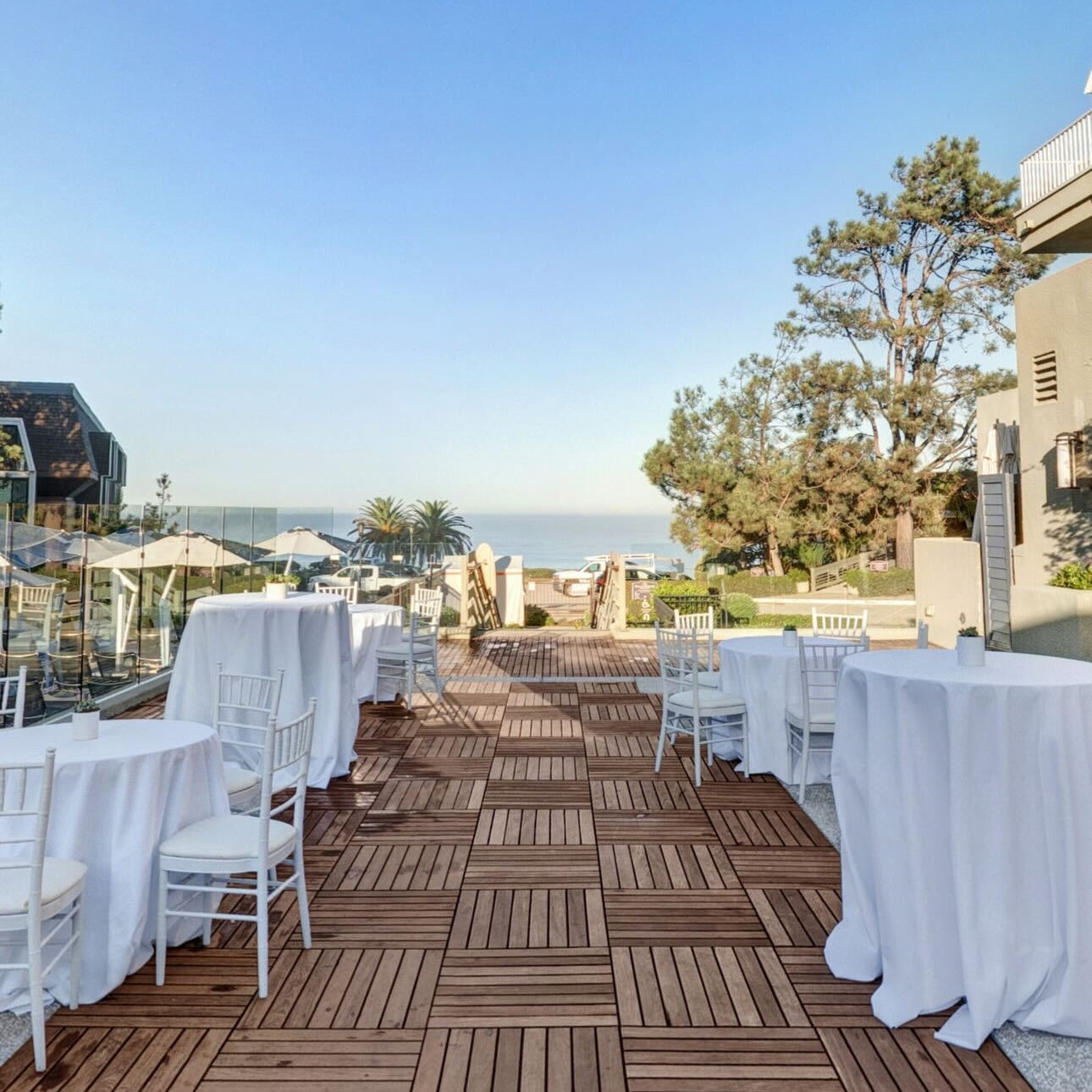 The pool deck dining area at L'Auberge Del Mar