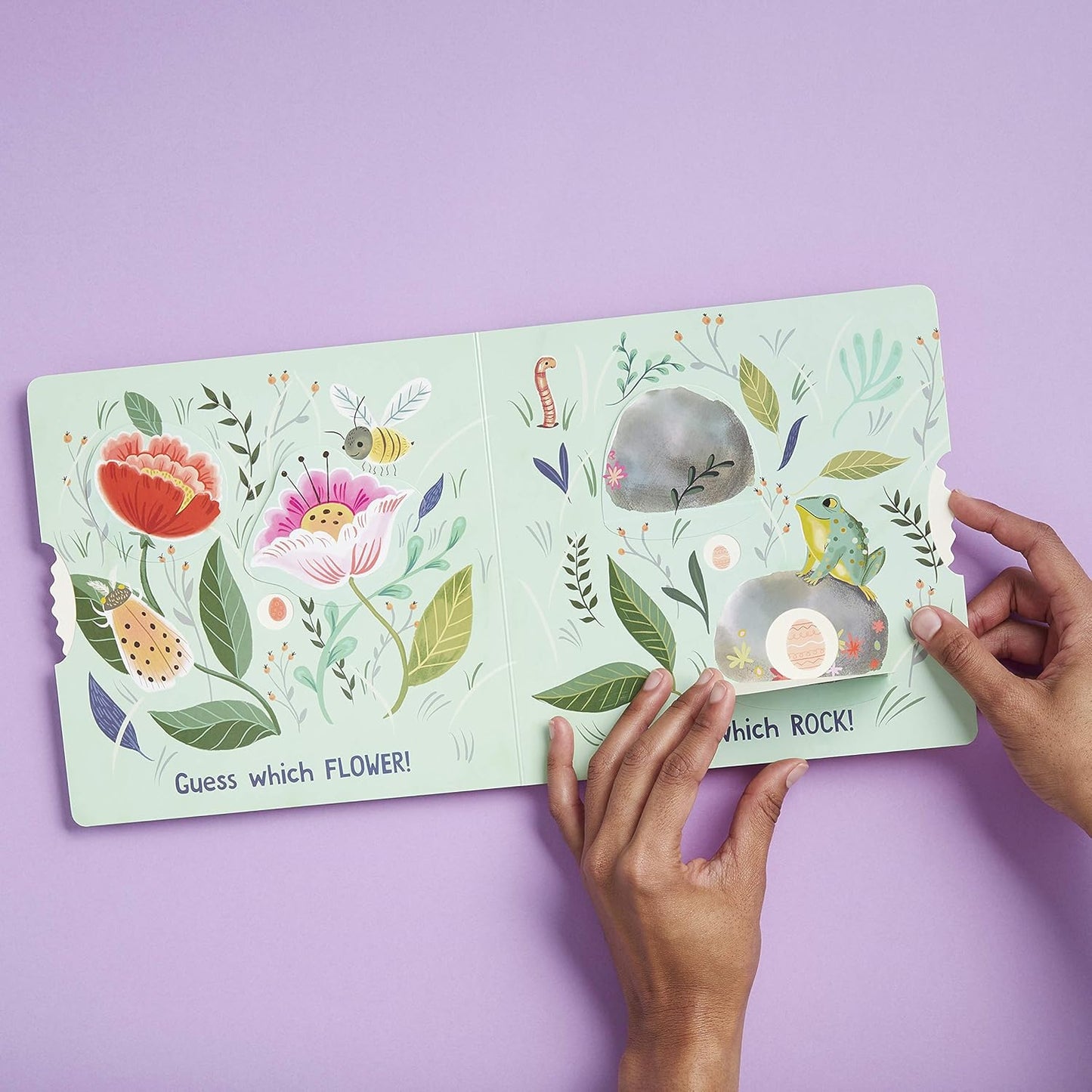 Children's book with floral illustrations on a purple background