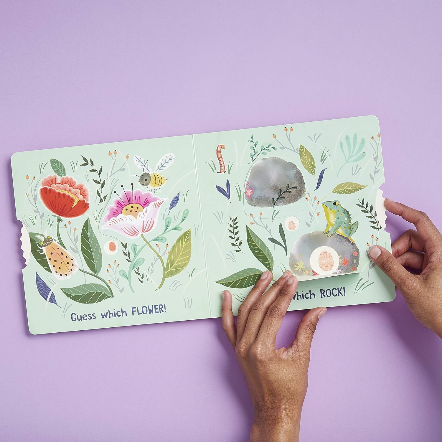 Children's book with floral illustrations on a purple background
