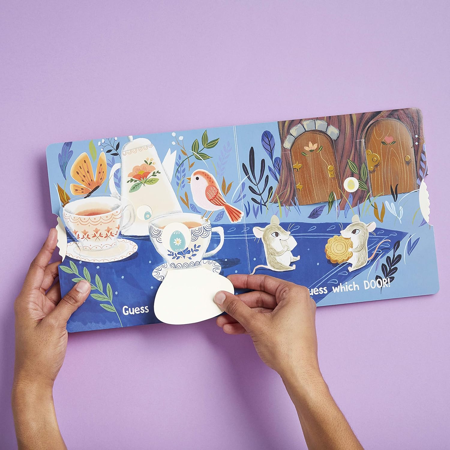 Children's book with interactive elements on a purple background