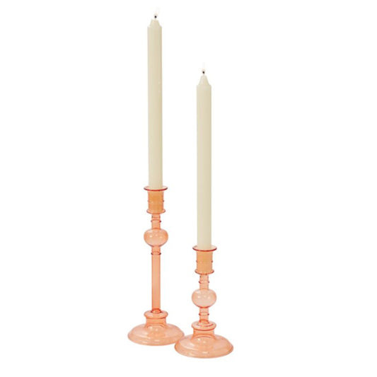 Create a trendsetting centerpiece with the slim, small Maren Candleholder. Made from very lightweight, handmade borosilicate glass in a warm amber tone, this candlestick with its classic shape &amp; trendy color is chic, unique, &amp; versatile for pairing with any style of home decor or wedding &amp; event design. Add a standard size taper candle &amp; layer with other tabletop pieces.