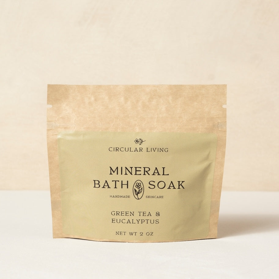 Kraft paper packaging of Mineral Bath Soak with 'Circular Living' branding on a beige background