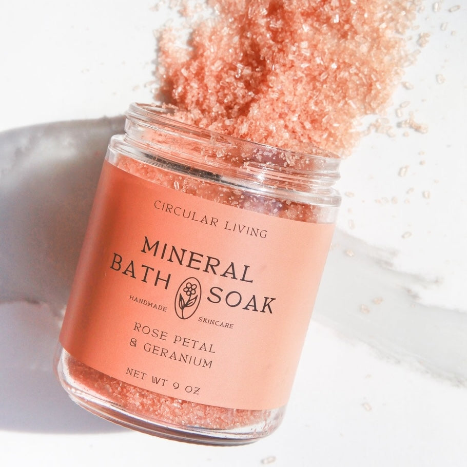 Jar of Mineral Bath Soak with a pink label on a white background