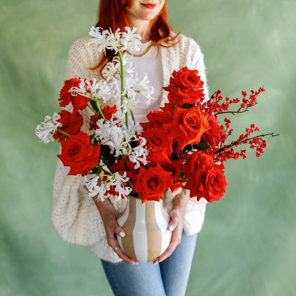 Meg holds Peppermint Petals flower Arrangement from Native Poppy
