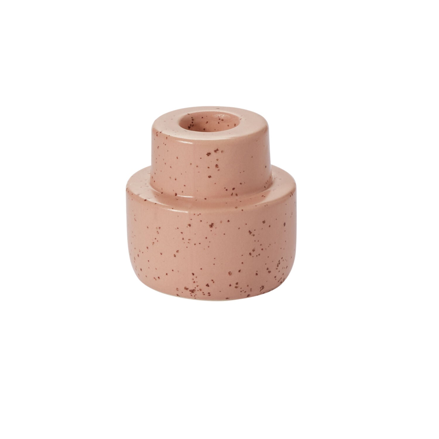 Speckled pink ceramic candleholder on a white background