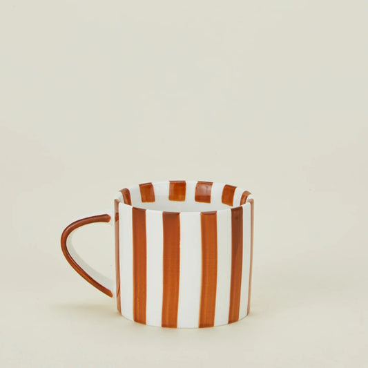 Bring a playful yet stylish touch to your morning routine. These mugs feature bold, colorful stripes that add a pop of personality to any kitchen.