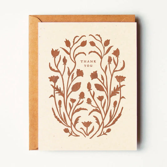 A sweet and timeless way to show your gratitude. This illustrated thank-you card features a delicate wildflower motif in a warm terracotta hue, printed on a soft cream background. Perfect for sending a thoughtful note after a gift, gathering, or everyday kindness.