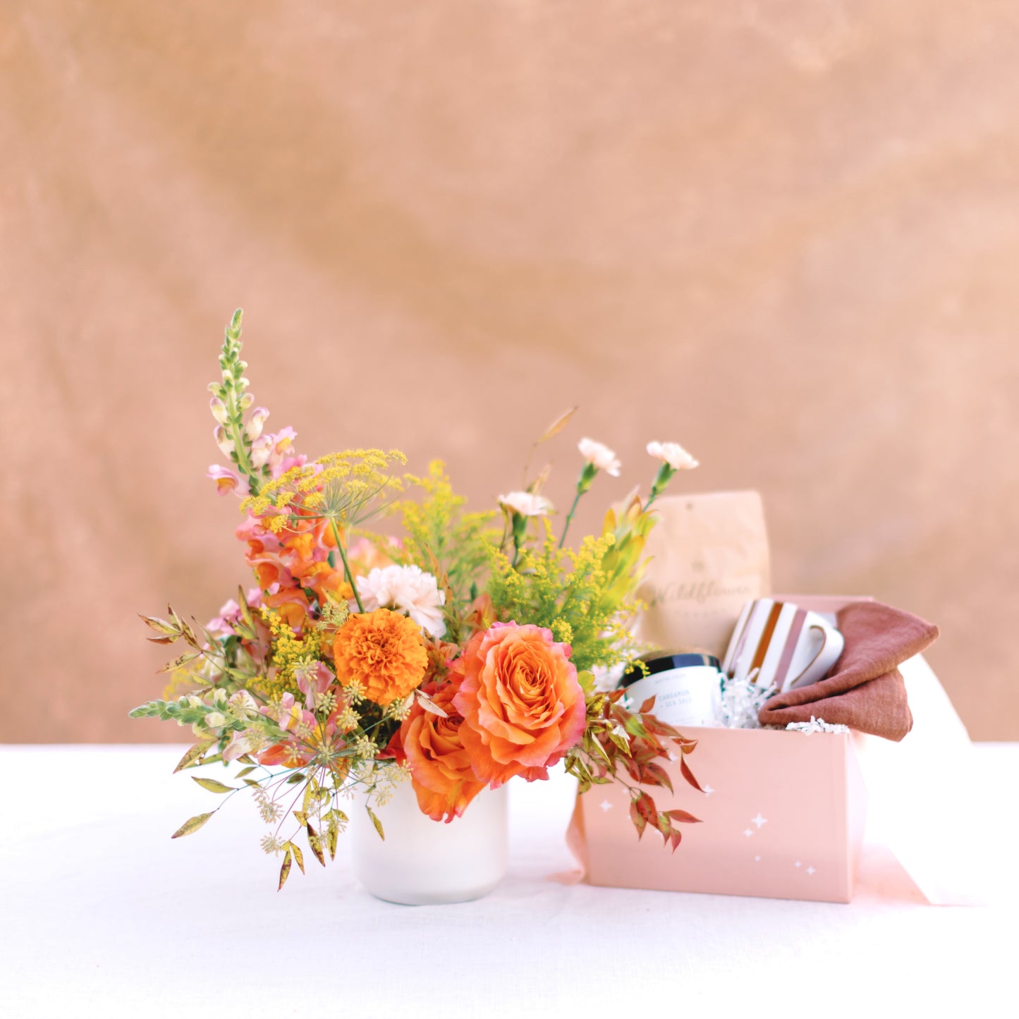 Wow the host with a gift they'll remember all year! We're making it easy to send some festive cheer this year. Our Thanksgiving gift box includes many of our seasonal favorites.

Your gift box will arrive beautifully wrapped in our exclusive peach box gift wrap, ready to gift to your favorite host.