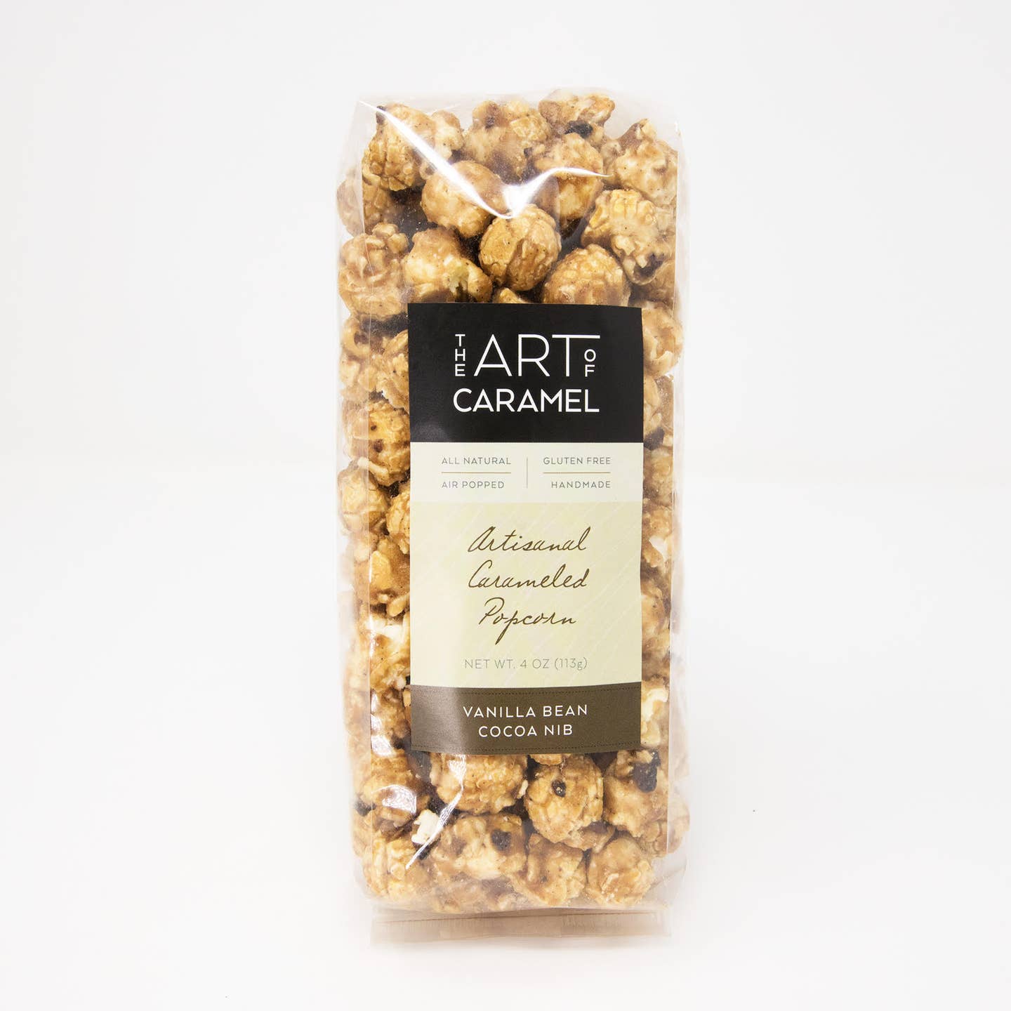 Bag of vanilla bean cocoa nib popcorn with 'The Art of Caramel' label on a white background
