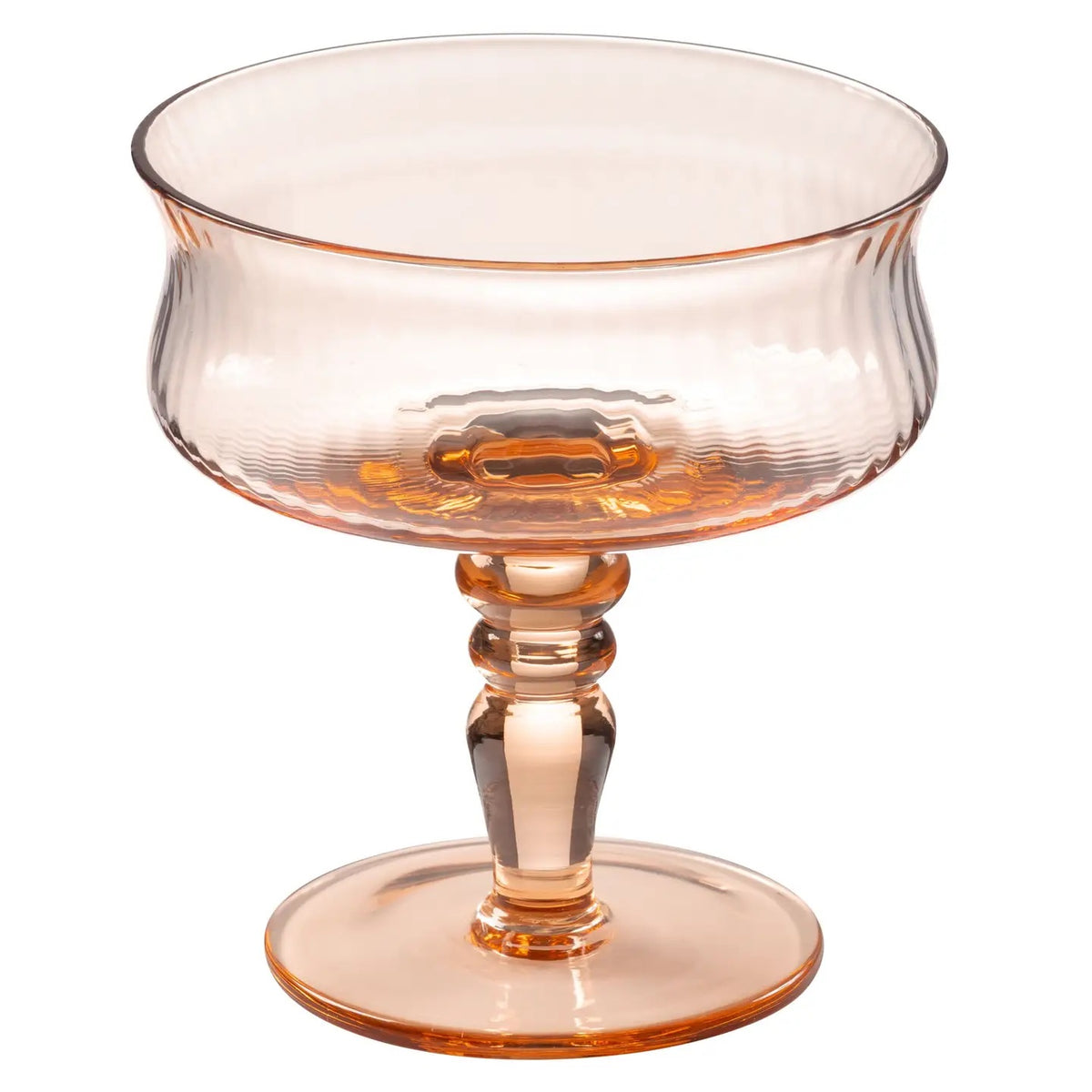 A softly tinted coupe with plenty of vintage romance. This antique peach glass has a warm, rosy glow, delicate ribbing, and a sculptural stem that gives it the feel of a special flea market find.