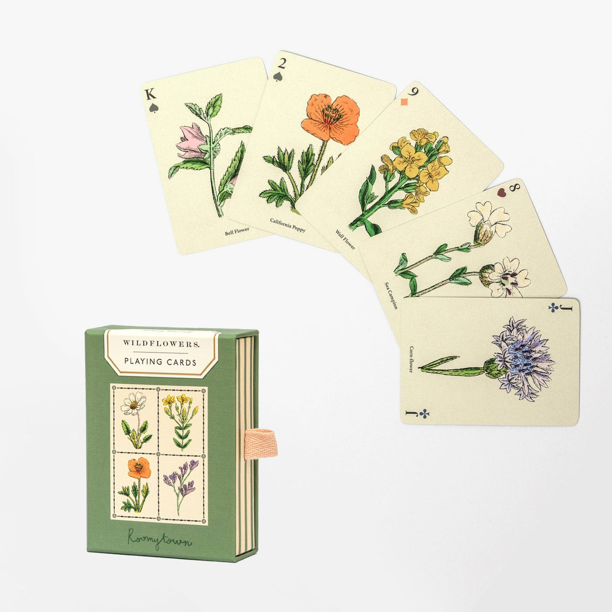 Playing cards with floral designs and a green box labeled 'Wildflowers Playing Cards' on a white background.