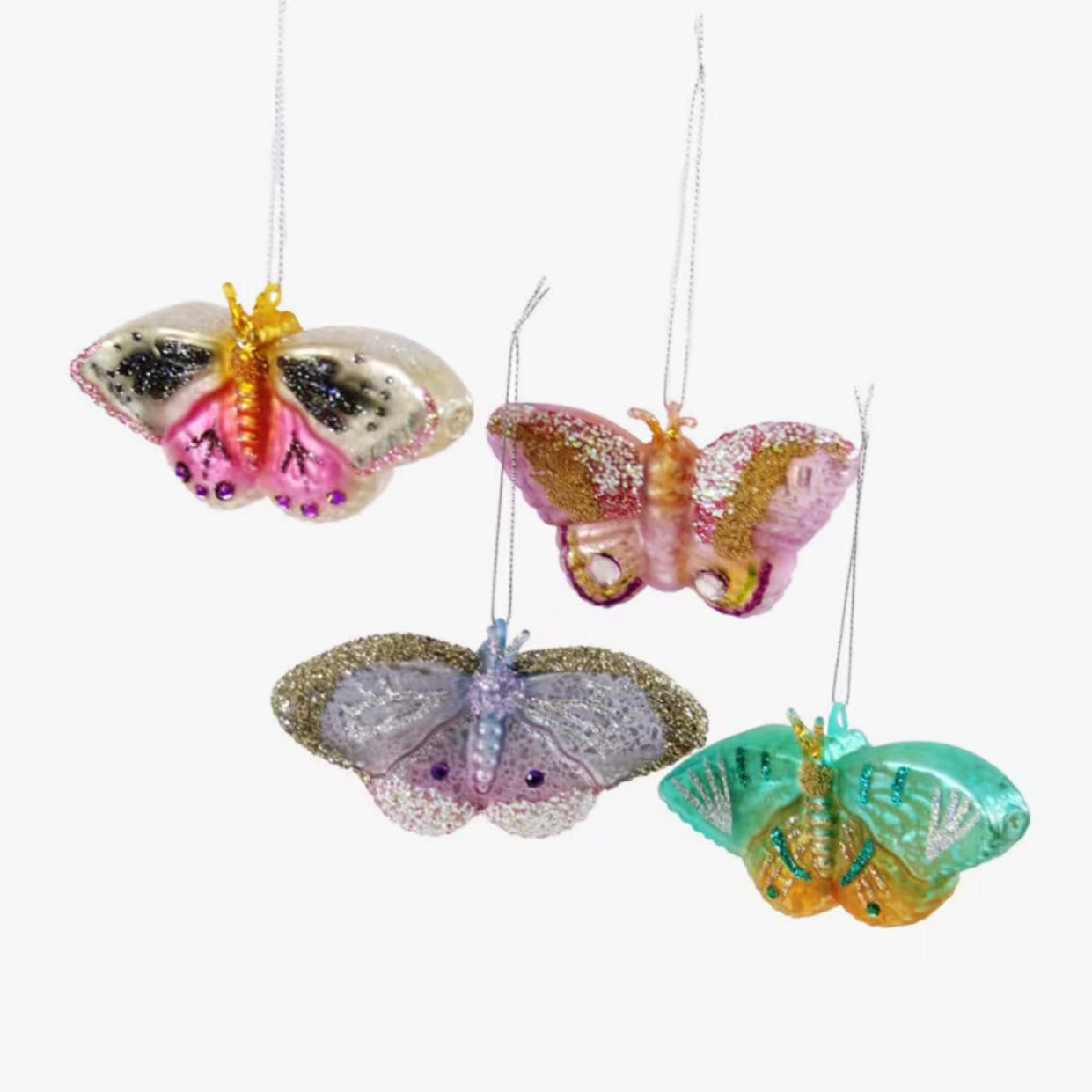Four colorful butterfly ornaments on a white background