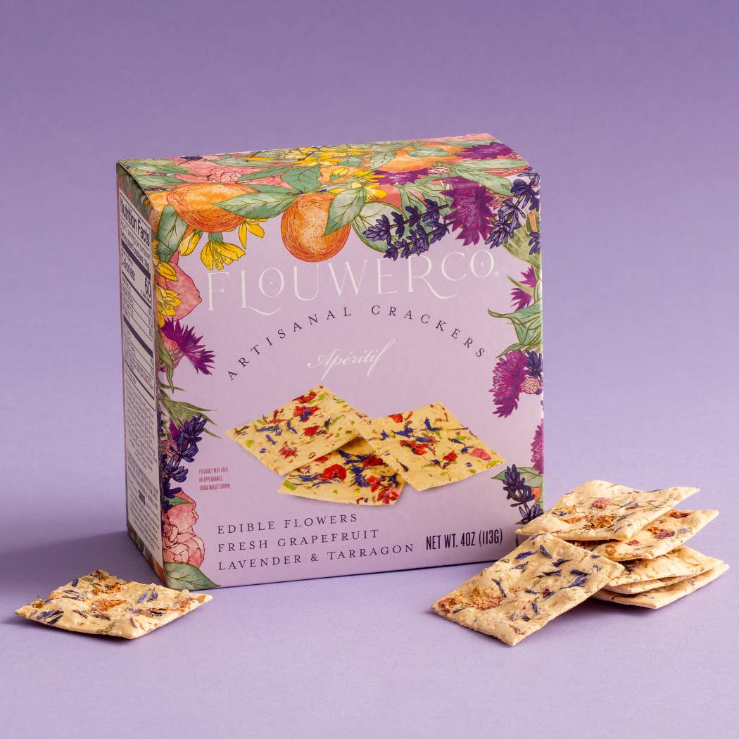 Flouwer cracker box with crackers on a purple background