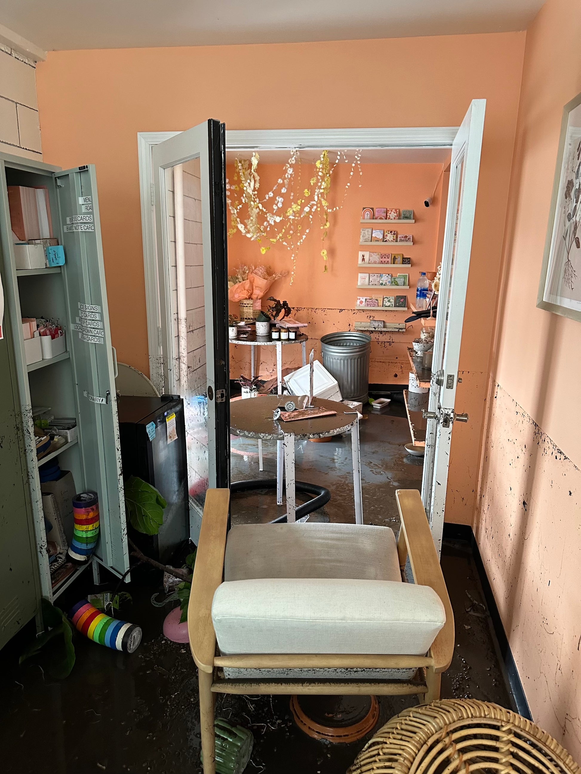 Flood damage to the retail area of Native Poppy's design warehouse in Mission Valley