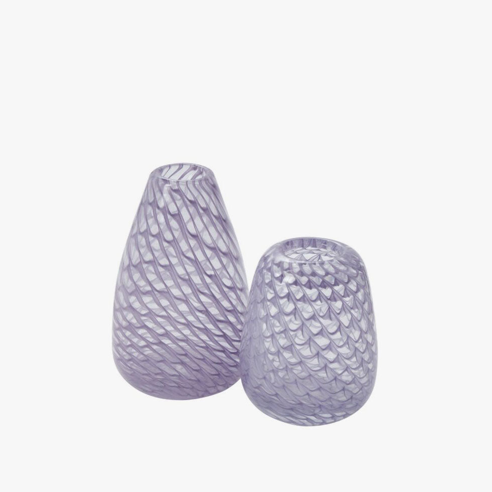 two purple glass bud vase with swirling patterns