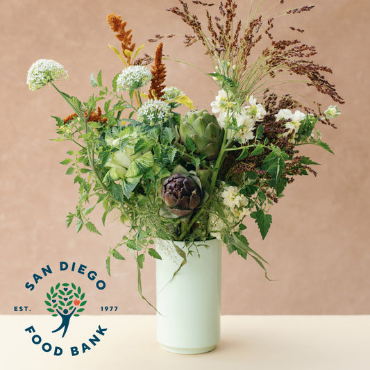 Bouquet of flowers in a light green vase on a beige background with a logo for the fundraising partner SD Food Bank