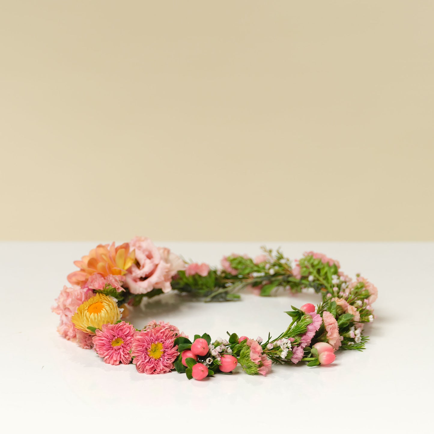 Bright and cheery asymmetrical flower crown from Native Poppy San Diego
