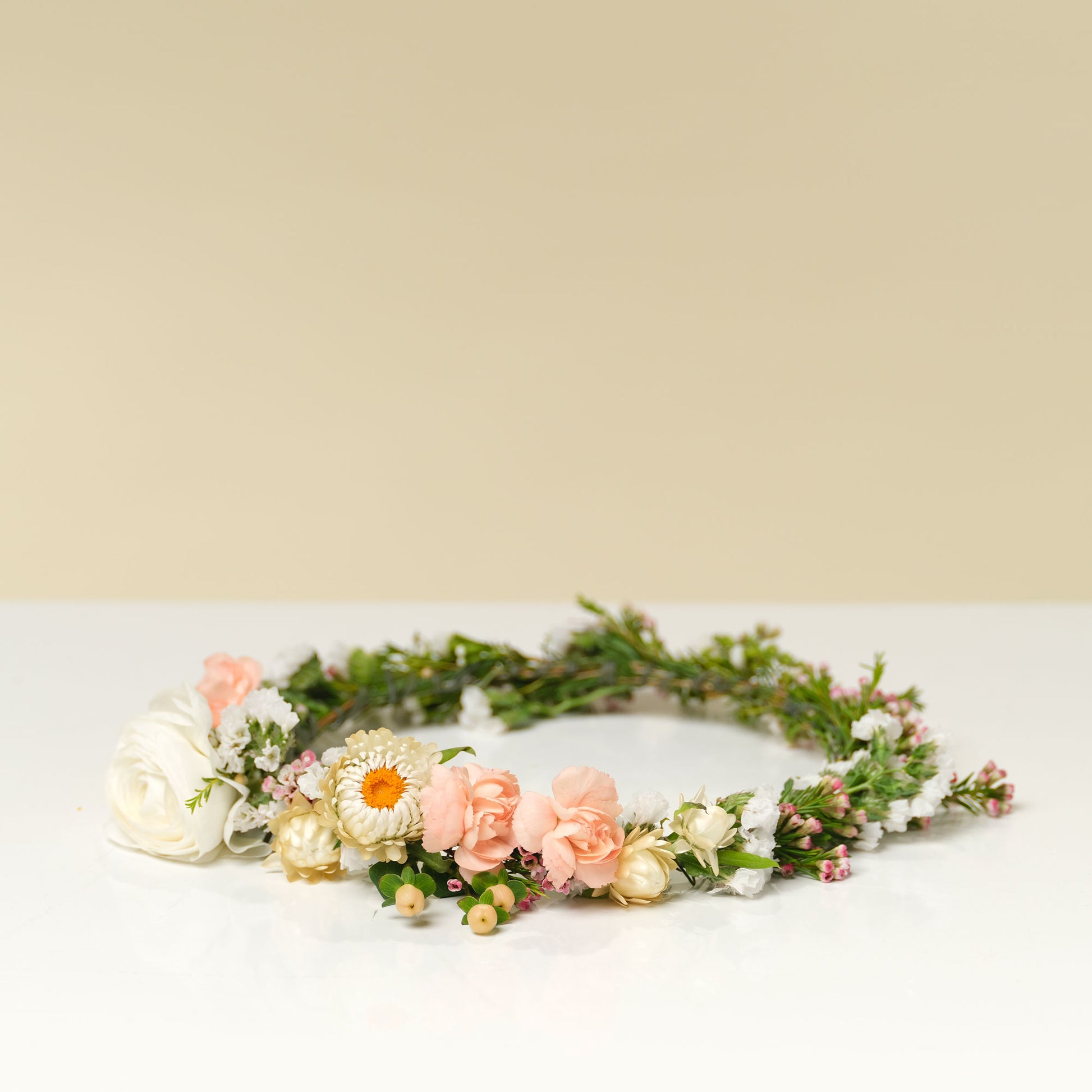 Neutral asymmetrical flower crown from Native Poppy San Diego