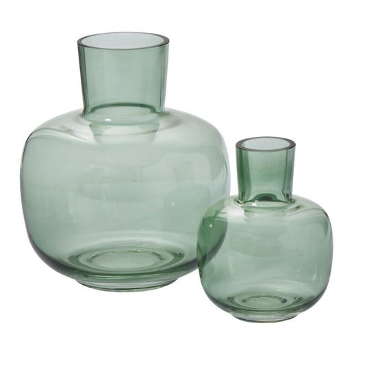 Two green glass vases on a white background