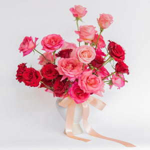 Large rose flower arrangement with peach bow from Native Poppy 